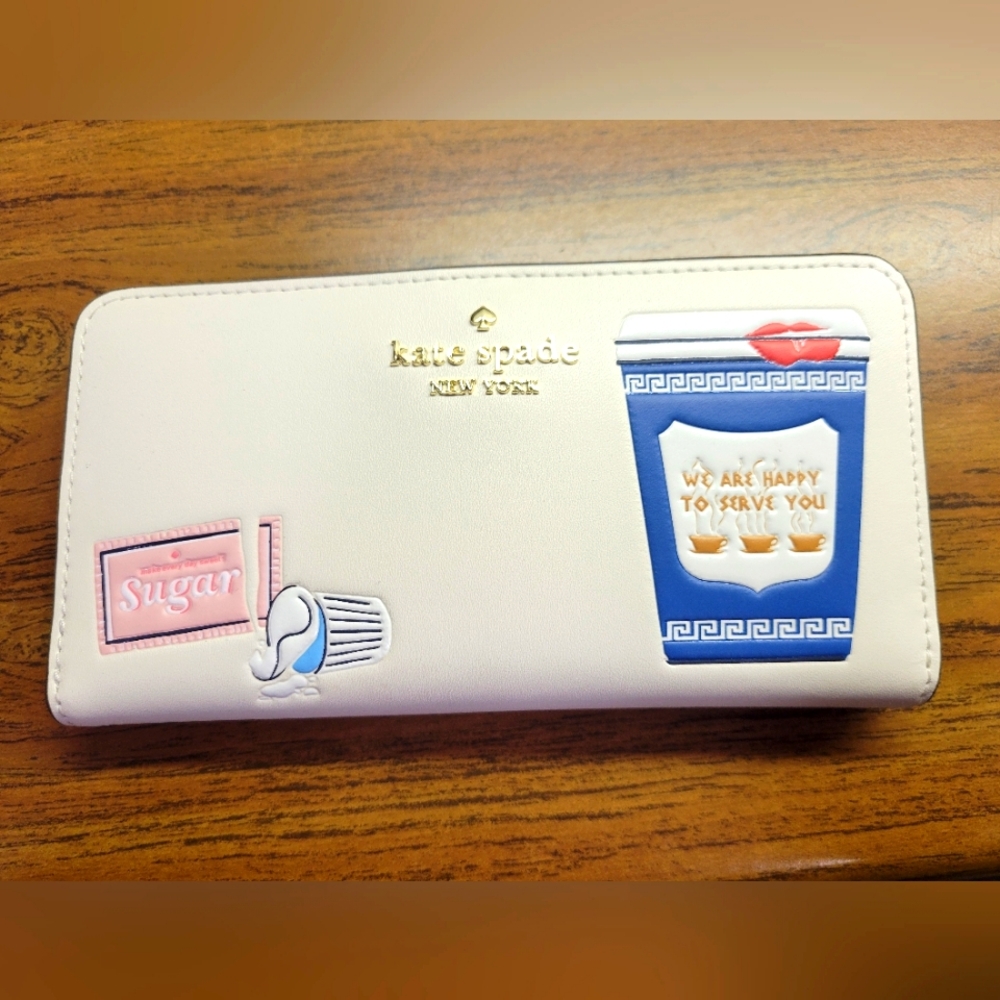 Kate Spade White and Blue Wallet with Playful Design